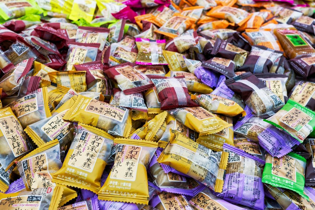 A stressed individual staring at fast food options.