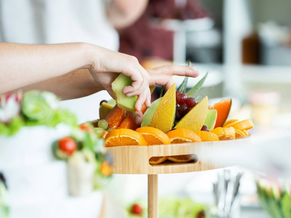 An open refrigerator with almost no food inside