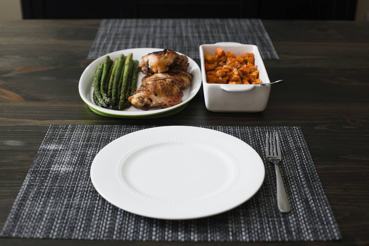 Dinner for two. Here's what on the menu tonight. Grilled chicken thighs, asparagus, and roasted Sweet potato.