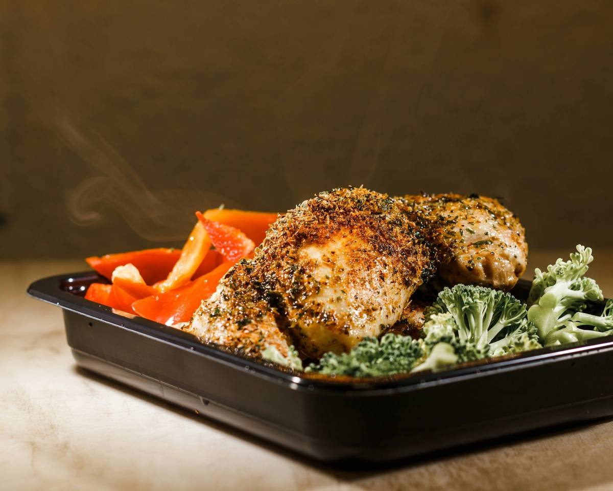 MealPro Herb Roasted Chicken Meal With Broccoli and Bell Pepper.